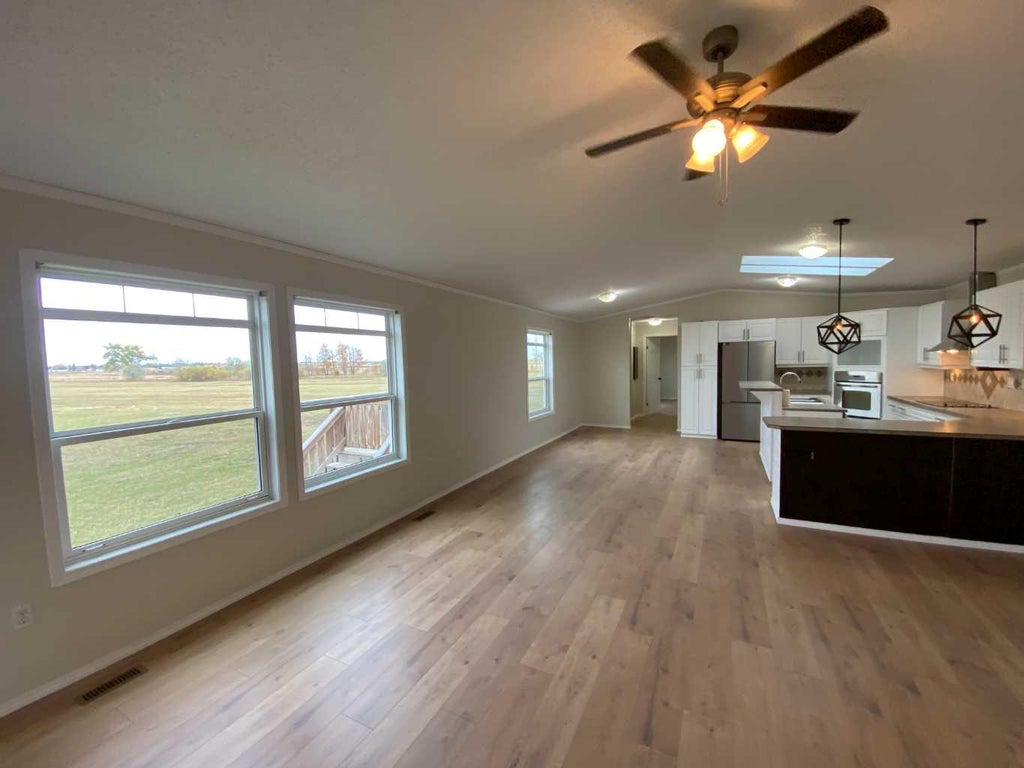 Photo of 127 Meadowplace Drive E, Brooks, AB T1R 0X1 (MLS # A2351216)