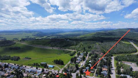 Photo of 502 Sunset Boulevard, Diamond Valley, AB T0L 2K0 (MLS # A2327781)