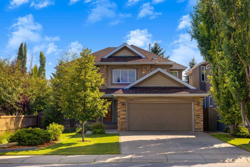 Photo of 1527 Evergreen Drive SW, Calgary, AB T2Y 2X7 (MLS # A2337001)
