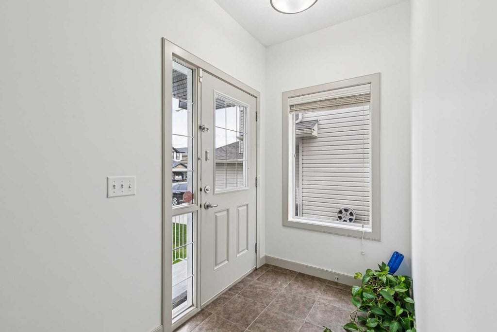 Photo of 67 Everwoods Park SW, Calgary, AB T2Y 0G3 (MLS # A2341089)