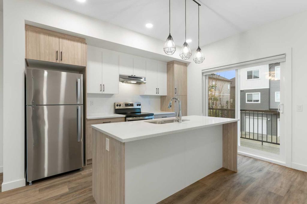 Photo of 24 Rivercrest Drive #103, Cochrane, AB T4C 2C5 (MLS # A2292607)