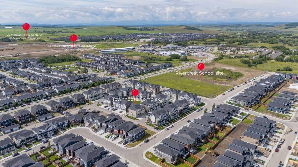 Photo of 24 Rivercrest Drive #103, Cochrane, AB T4C 2C5 (MLS # A2292607)