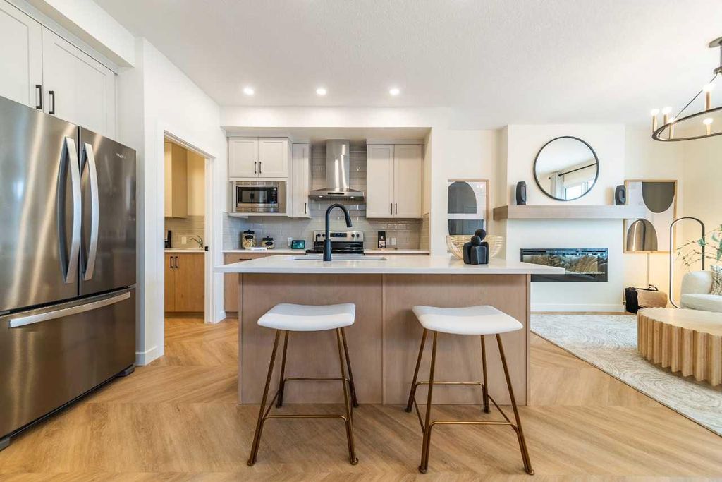 Photo of 651 Chelsea Pier Run, Chestermere, AB T1X 3H6 (MLS # A2282006)