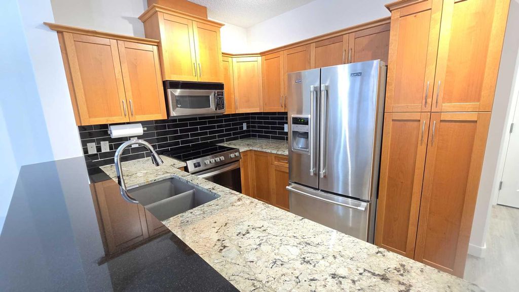 Photo of 10 Discovery Ridge Close SW #201, Calgary, AB T3H 5X4 (MLS # A2282388)