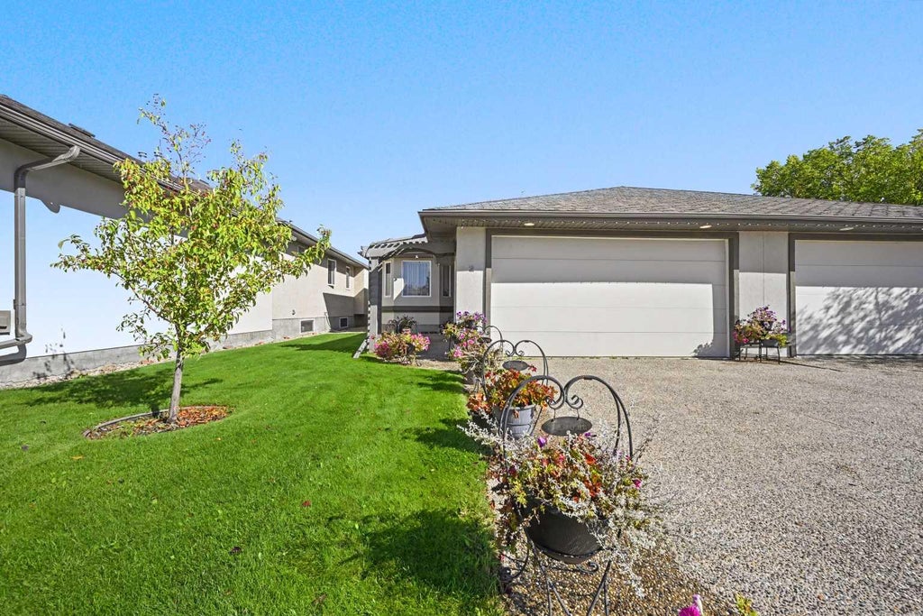Photo of 8910 122 Avenue #2, Grande Prairie, AB T8X 1P8 (MLS # A2342994)
