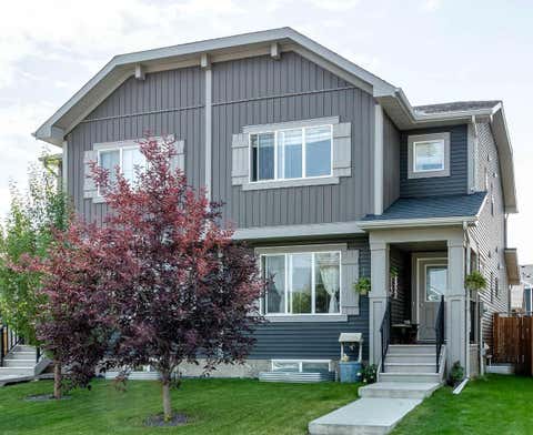 Photo of 7 Emberside Hollow, Cochrane, AB T4C 2L6 (MLS # A2339447)