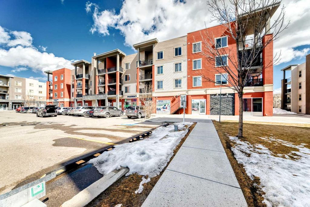 Photo of 403 Mackenzie Way SW #1305, Airdrie, AB T4B 3V7 (MLS # A2300210)