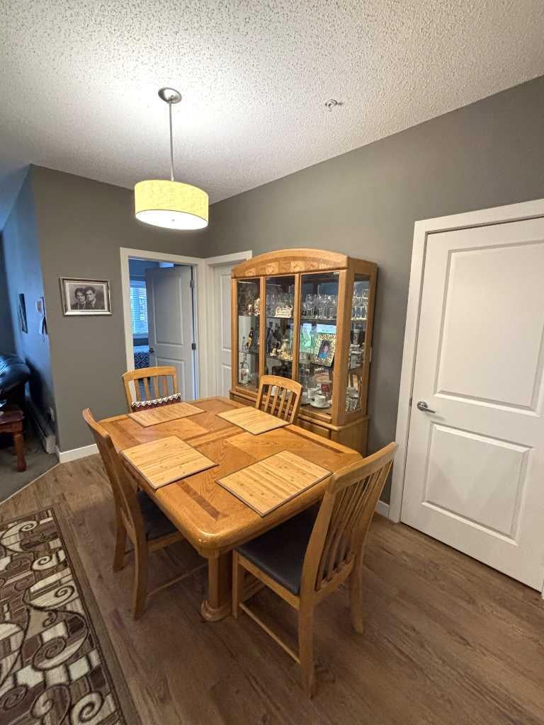 Photo of 11 Millrise Drive SW #212, Calgary, AB T2Y 0K7 (MLS # A2348730)