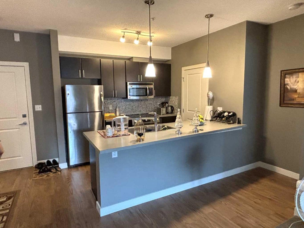 Photo of 11 Millrise Drive SW #212, Calgary, AB T2Y 0K7 (MLS # A2348730)