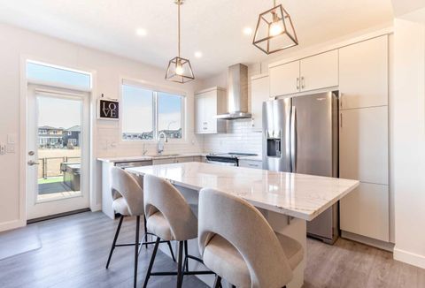 Photo of 319 Belmont Heath SW, Calgary, AB T2X 4N3 (MLS # A2295680)