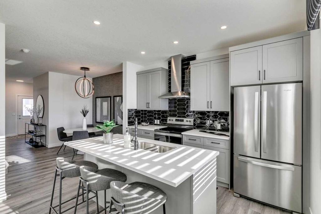 Photo of 592 Buffaloberry Manor SE, Calgary, AB T3M 3Z2 (MLS # A2283703)