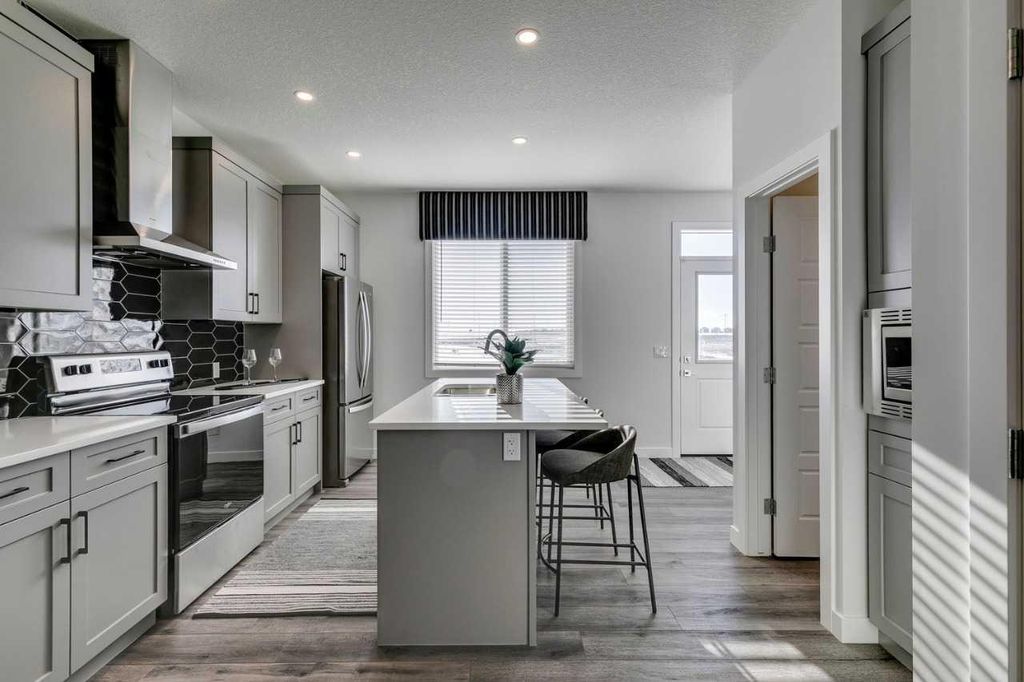 Photo of 592 Buffaloberry Manor SE, Calgary, AB T3M 3Z2 (MLS # A2283703)