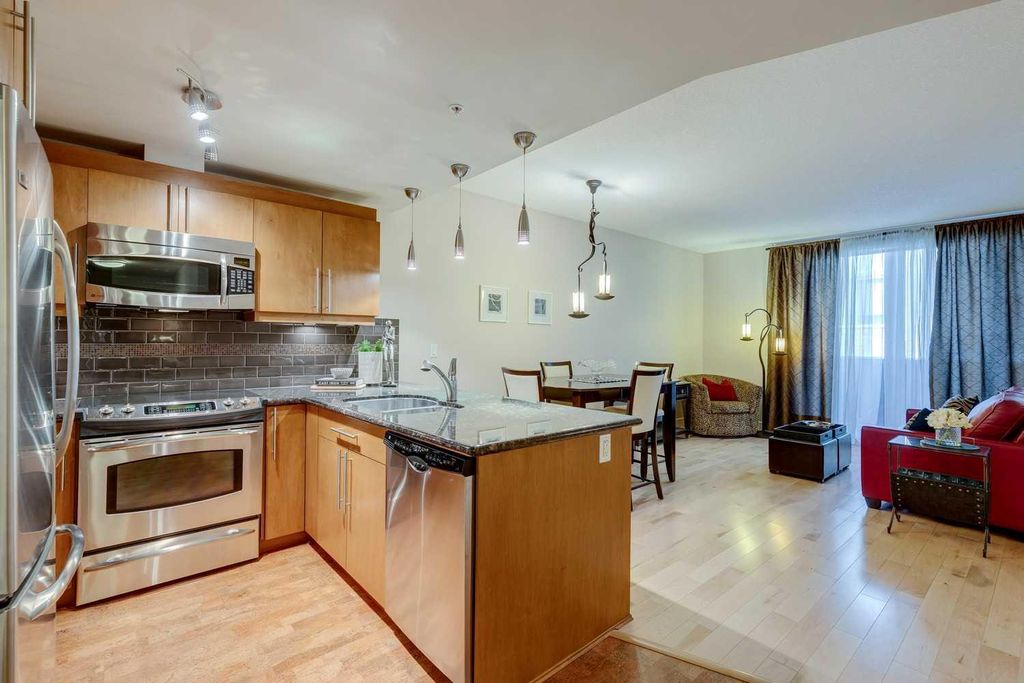 Photo of 817 15 Avenue SW #206, Calgary, AB T2R 0H8 (MLS # A2303279)