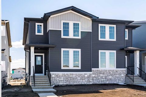 Photo of 217 Bridgeport Gate, Chestermere, AB T1X 3E2 (MLS # A2306431)