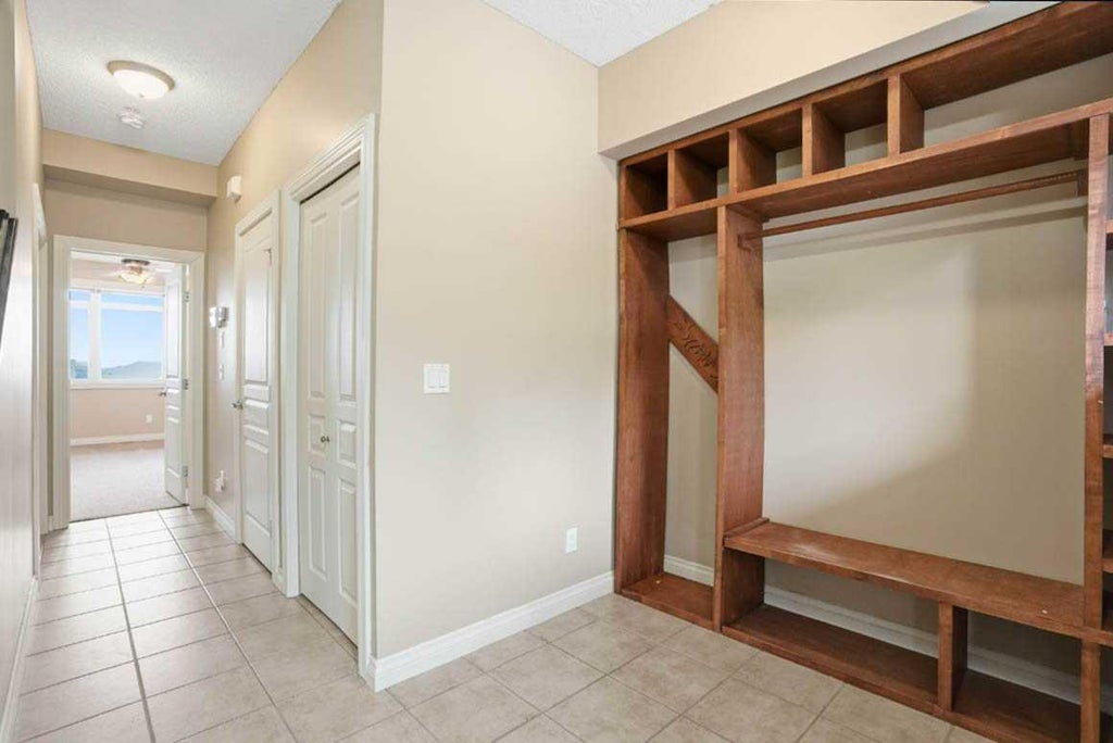 Photo of 148 Rockyledge View NW #11, Calgary, AB T3G 5Y4 (MLS # A2335154)