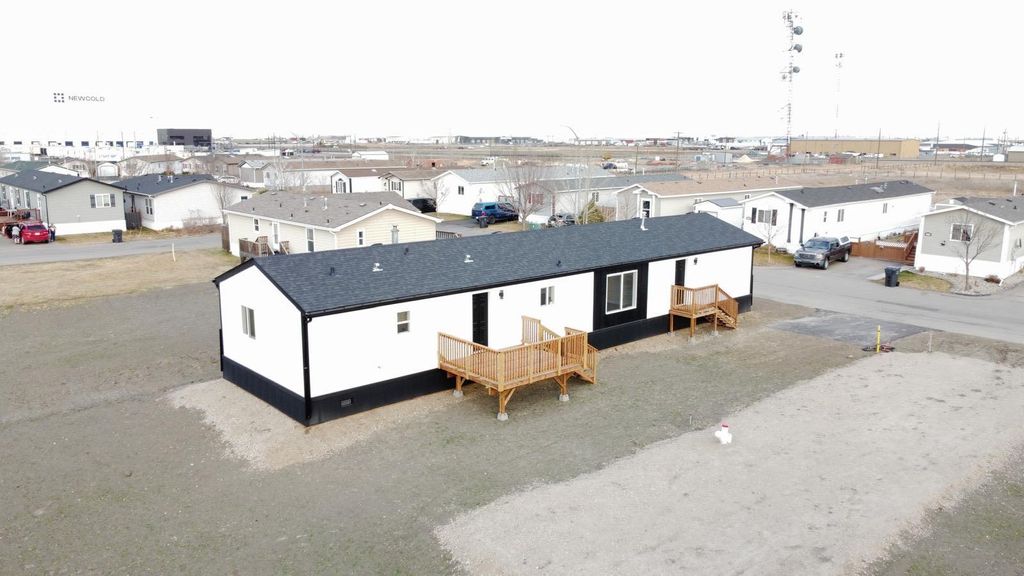 Photo of 384-410 Conductor Blvd, Coaldale, AB T1M 1P6 (MLS # A2293350)