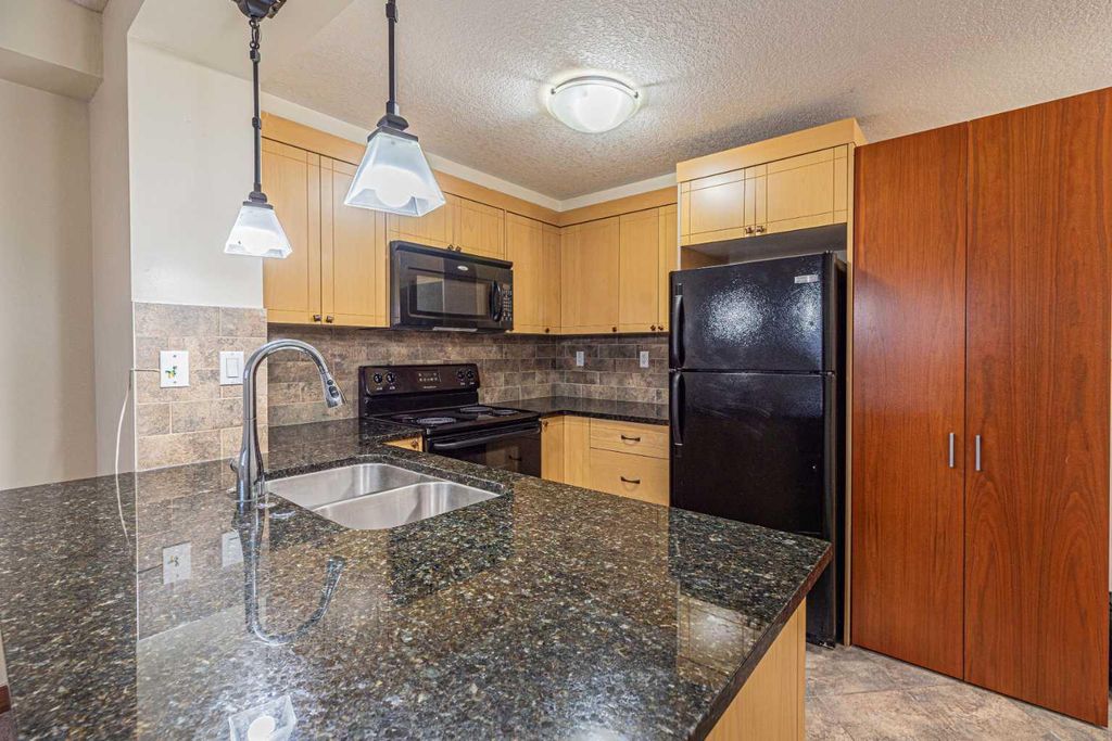 Photo of 920 68 Avenue SW #111, Calgary, AB T2V 0N6 (MLS # A2294959)