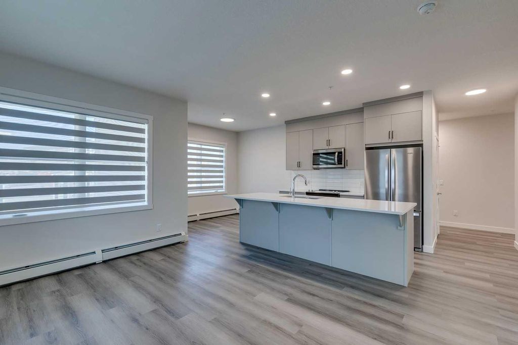 Photo of 55 Wolf Hollow Crescent SE #113, Calgary, AB T2X 5K9 (MLS # A2287003)