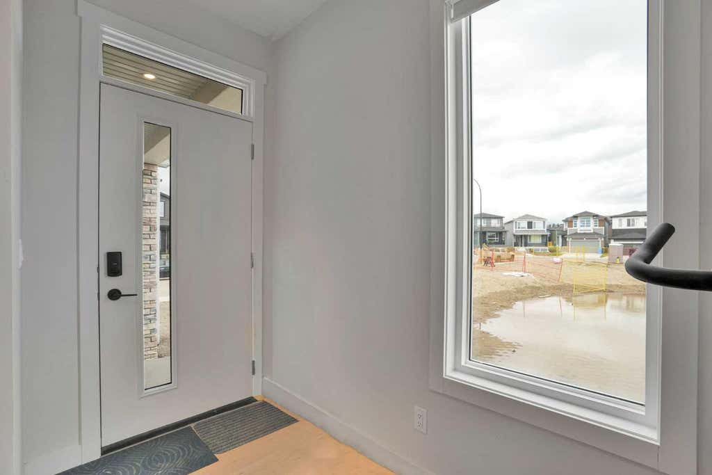 Photo of 101 Wolf Hollow Terrace SE, Calgary, AB T2X 6C5 (MLS # A2338776)