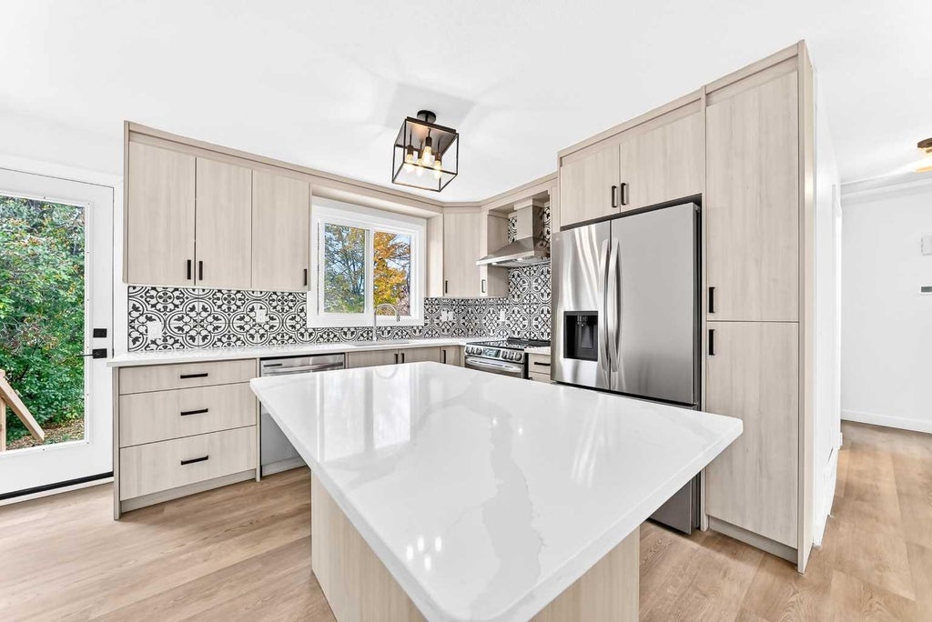 Photo of 856 Rundlecairn Way NE, Calgary, AB T1Y 2R7 (MLS # A2351479)