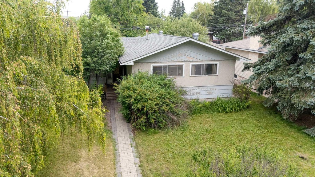 Photo of 2836 Brentwood Boulevard NW, Calgary, AB T2L 1J5 (MLS # A2338594)