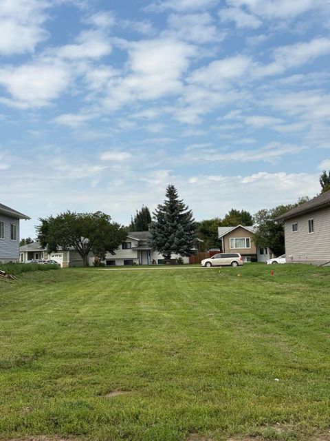 Photo of 117 Upland Boulevard W, Brooks, AB T1R 1C5 (MLS # A2243691)
