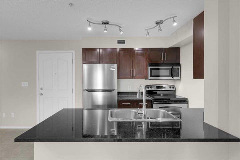 Photo of 7130 80 Avenue NE #204, Calgary, AB T3J 0N5 (MLS # A2352826)