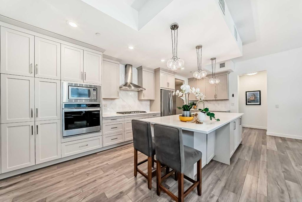 Photo of 10 Mahogany Circle SE #101, Calgary, AB T3M 2V7 (MLS # A2292489)