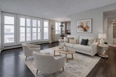 Photo of 733 14 Avenue SW #905, Calgary, AB T2R 0W1 (MLS # A2302920)