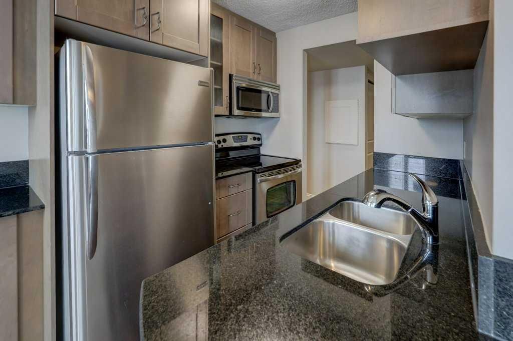 Photo of 733 14 Avenue SW #905, Calgary, AB T2R 0W1 (MLS # A2302920)
