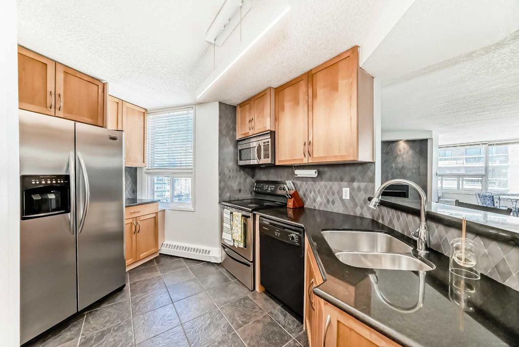 Photo of 626 15 Avenue SW #703, Calgary, AB T2R 0R5 (MLS # A2301762)