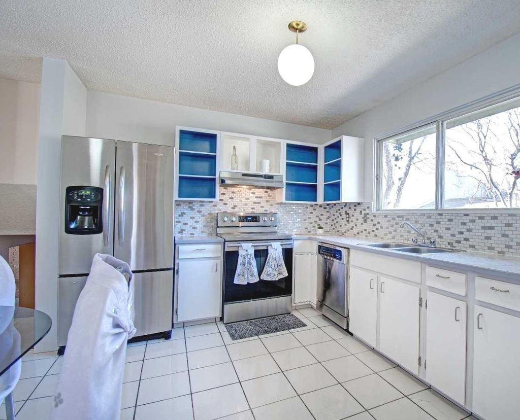 Photo of 6307 Thornaby Way NW, Calgary, AB T2K 5K8 (MLS # A2292423)