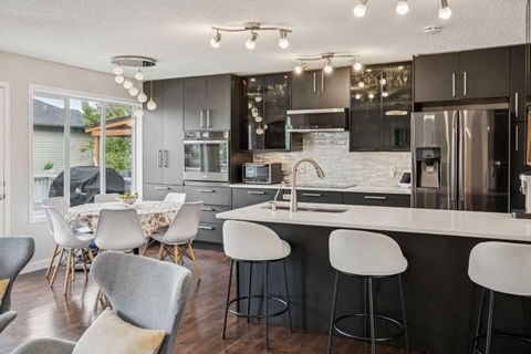 Photo of 171 Everhollow Way SW, Calgary, AB T2Y 4R7 (MLS # A2264818) Photo of 171 Everhollow Way SW, Calgary, AB T2Y 4R7 (MLS # A2264818)