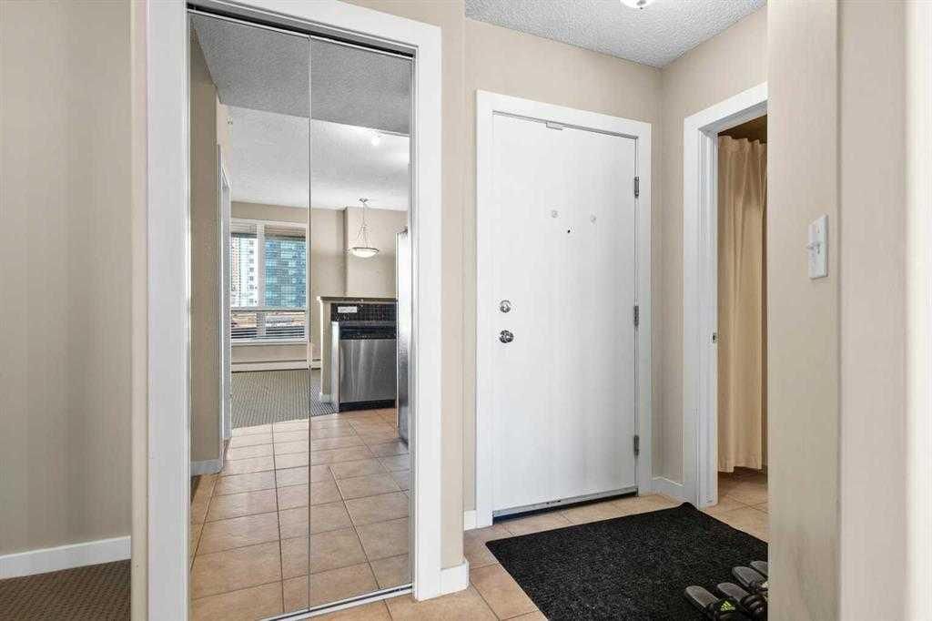 Photo of 1053 10 Street SW #411, Calgary, AB T2R 1S6 (MLS # A2296276)