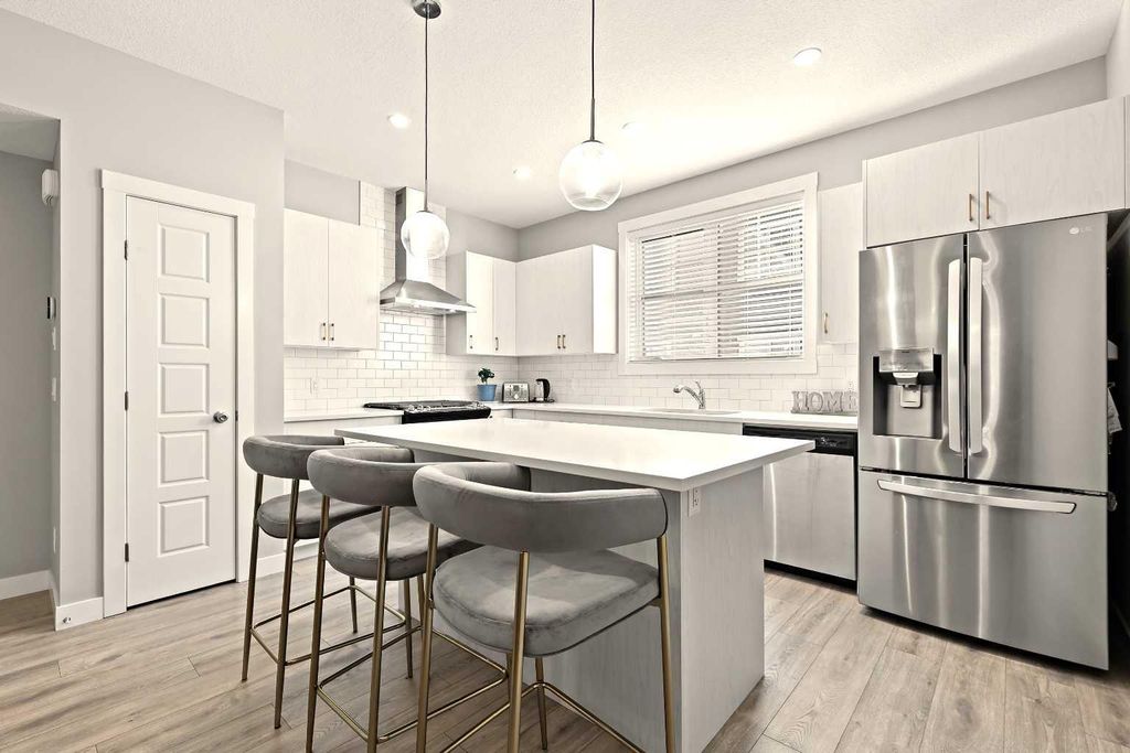 Photo of 410 Cranbrook Walk SE, Calgary, AB T3M 2V5 (MLS # A2272145)