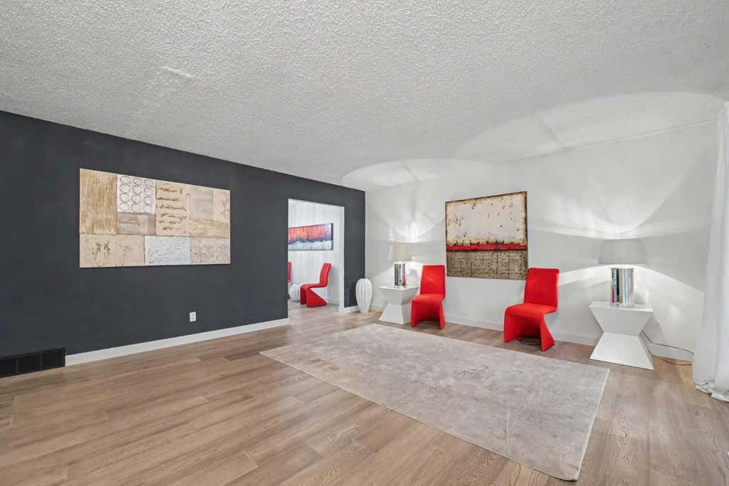 Photo of 711 118 Avenue SW, Calgary, AB T2W 0E6 (MLS # A2339425)
