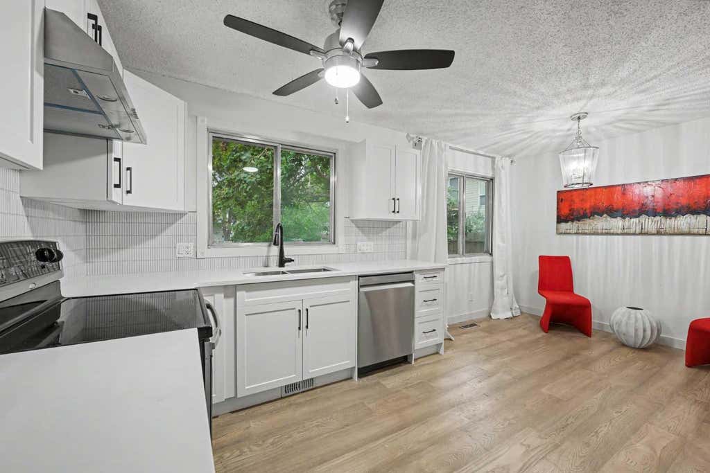 Photo of 711 118 Avenue SW, Calgary, AB T2W 0E6 (MLS # A2339425)