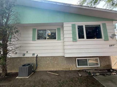Photo of 5811a 50 Street N, Taber, AB T1G 1K6 (MLS # A2331851)