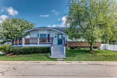 Photo of 85 Rideau Close SW, Airdrie, AB T4B 1A7 (MLS # A2310084)