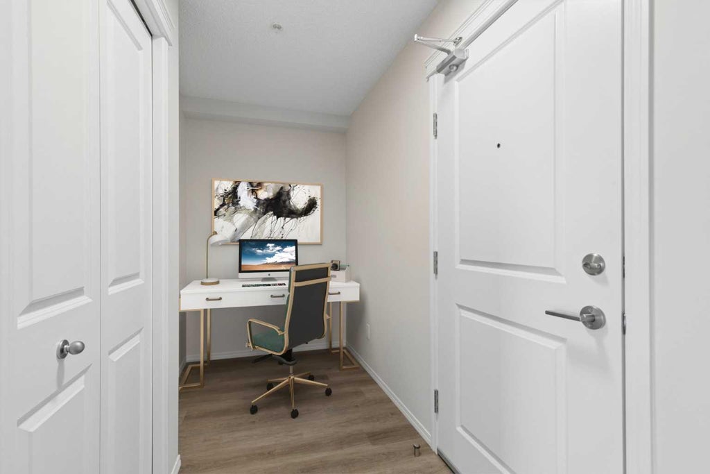 Photo of 115 Prestwick Villas SE #1304, Calgary, AB T2Z 0M8 (MLS # A2351941)