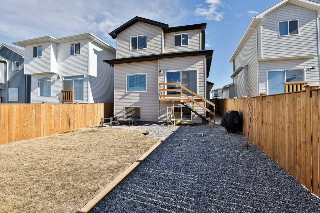 Photo of 174 Caribou Bend N, Lethbridge, AB T1H 7J8 (MLS # A2287592)