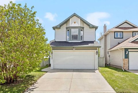 Photo of 242 Hidden Spring Mews NW, Calgary, AB T3A 5N3 (MLS # A2308714)