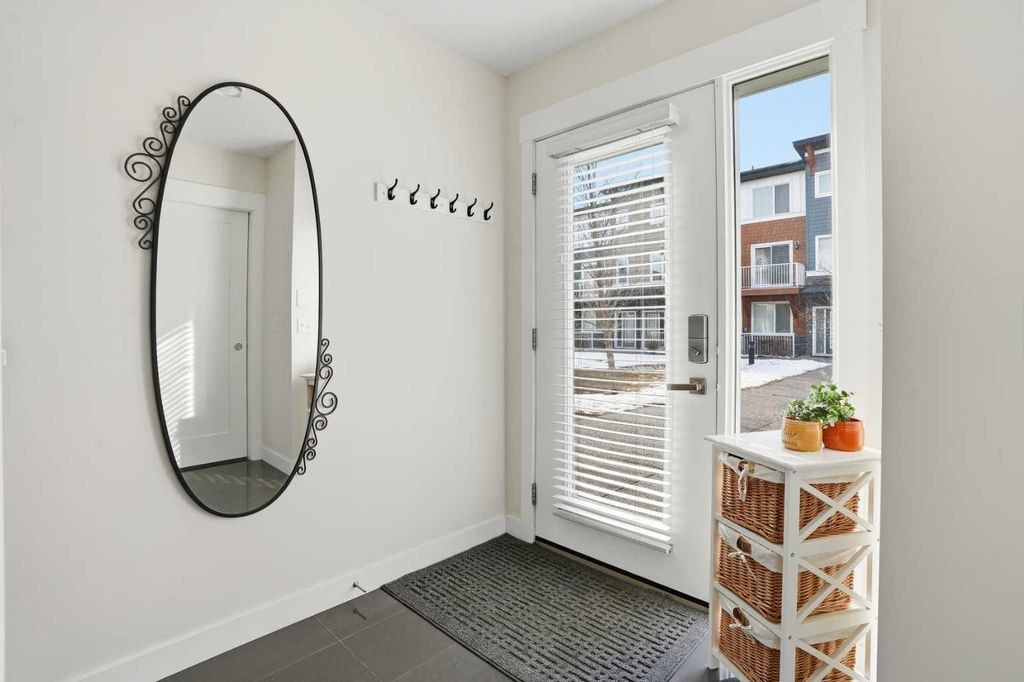 Photo of 111 Rainbow Falls Gate #70, Chestermere, AB T1X 0Z4 (MLS # A2282334)