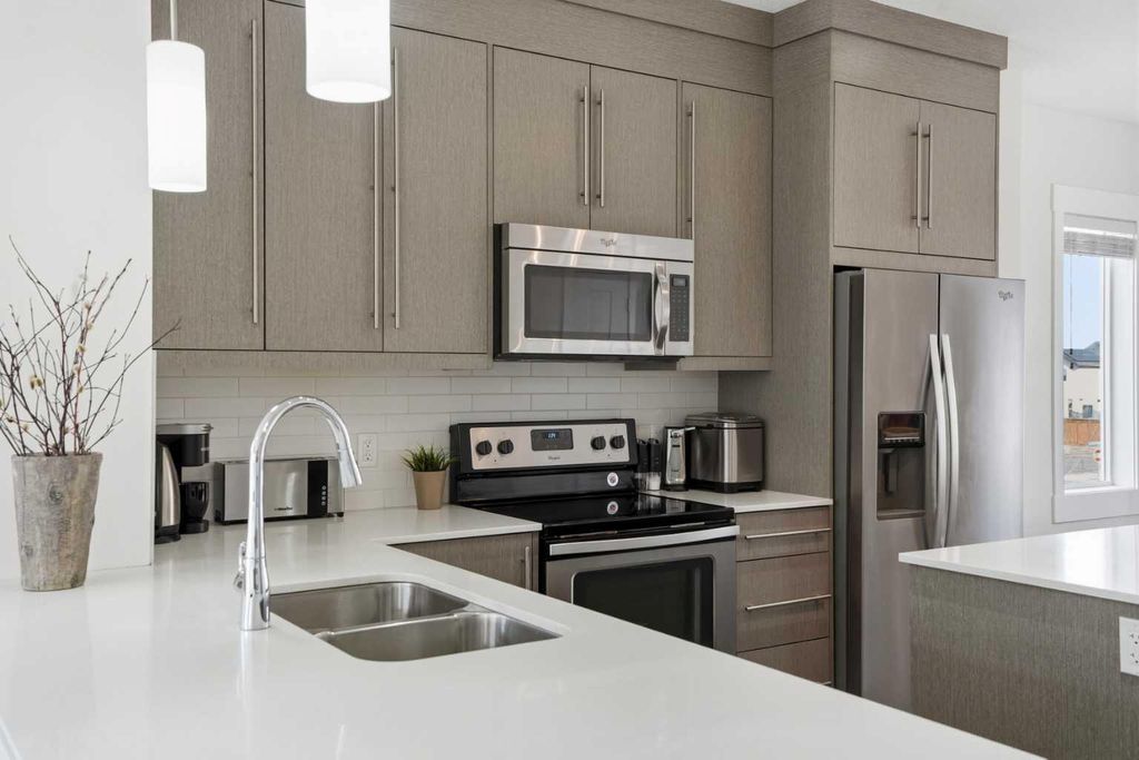 Photo of 111 Rainbow Falls Gate #70, Chestermere, AB T1X 0Z4 (MLS # A2282334)