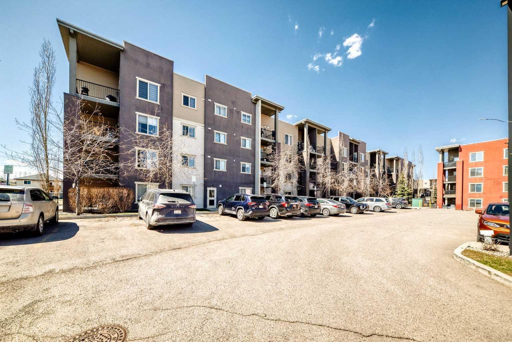 Photo of 403 Mackenzie Way SW #4304, Airdrie, AB T4B 3V7 (MLS # A2306542)