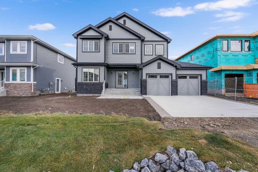 Photo of 142 Sunstone Way, Balzac, AB T4B 5T5 (MLS # A2348405)
