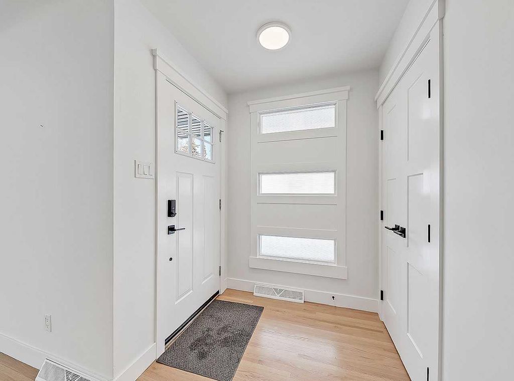 Photo of 23 Cambrian Drive NW, Calgary, AB T2K 1P3 (MLS # A2291878)