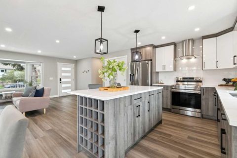 Photo of 7116 Hunterwood Road NW, Calgary, AB T2K 4J6 (MLS # A2311232)