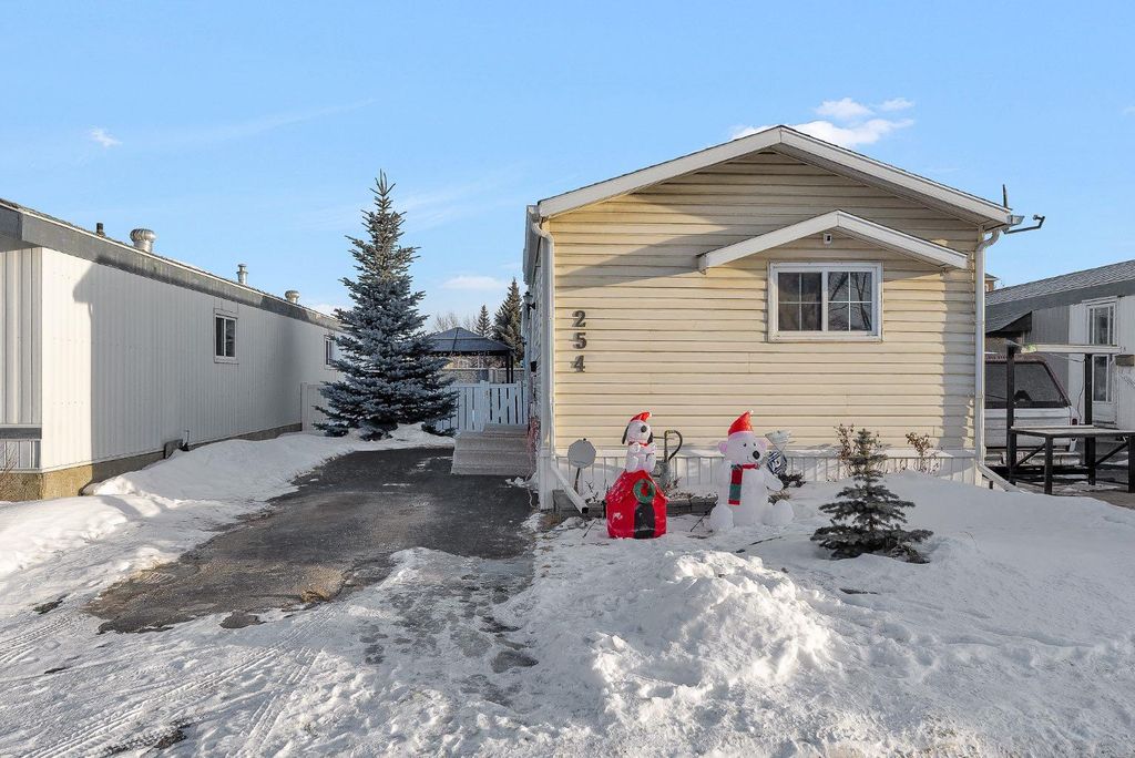 Photo of 254 Erin Woods Circle SE, Calgary, AB T2B 3C9 (MLS # A2278048)