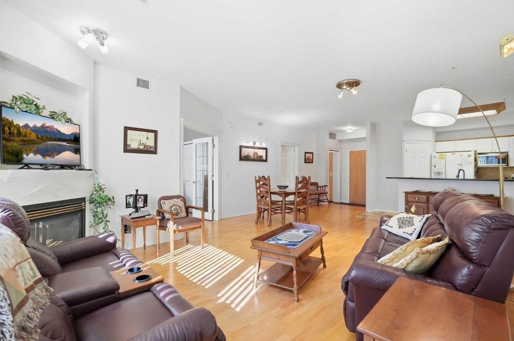 Photo of 223 Tuscany Springs Boulevard NW #268, Calgary, AB T3L 2M2 (MLS # A2345118)